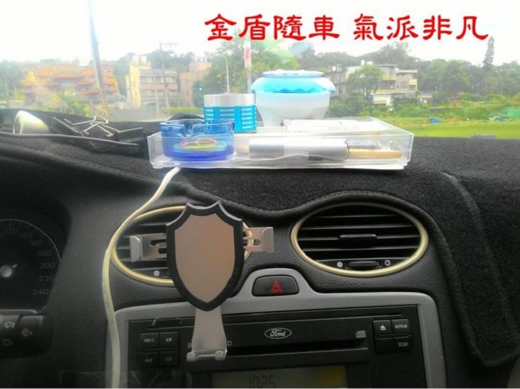 盾牌重力自動鎖手機支架